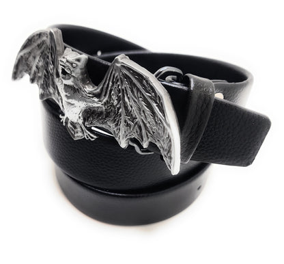 Black belt with a silver bat buckle on a white background